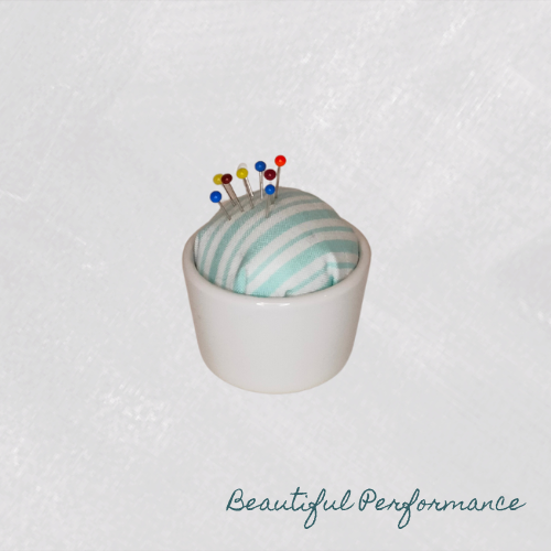 Nuppineulatyyny kupissa